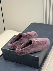PRADA 25S CLOGS IN WINE RED SHEARLING