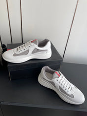 PRADA 26S AMERICA CUP SNEAKERS IN WHITE SOFT RUBBER AND BIKE FABRIC
