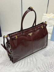 PRADA 25S BONNIE EXTRA-LARGE 42 IN DARK BROWN GLOSSY CALFSKIN GOLD HARDWARE