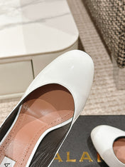 ALAIA ROUND-TOE HIGH HEELS 10 CM IN WHITE CALFSKIN