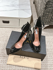 ALAIA ROUND-TOE HIGH HEELS 10 CM IN BLACK CALFSKIN