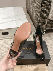ALAIA ROUND-TOE HIGH HEELS 10 CM IN BLACK CALFSKIN
