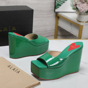 ALAIA PLATFORM WEDGE IN COOL GREEN LAMBSKIN WITH RED HEART