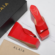 ALAIA PLATFORM WEDGE IN CHERRY RED LAMBSKIN WITH HEART EMBROIDERED