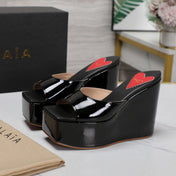 ALAIA PLATFORM WEDGE IN BLACK LAMBSKIN WITH RED HEART