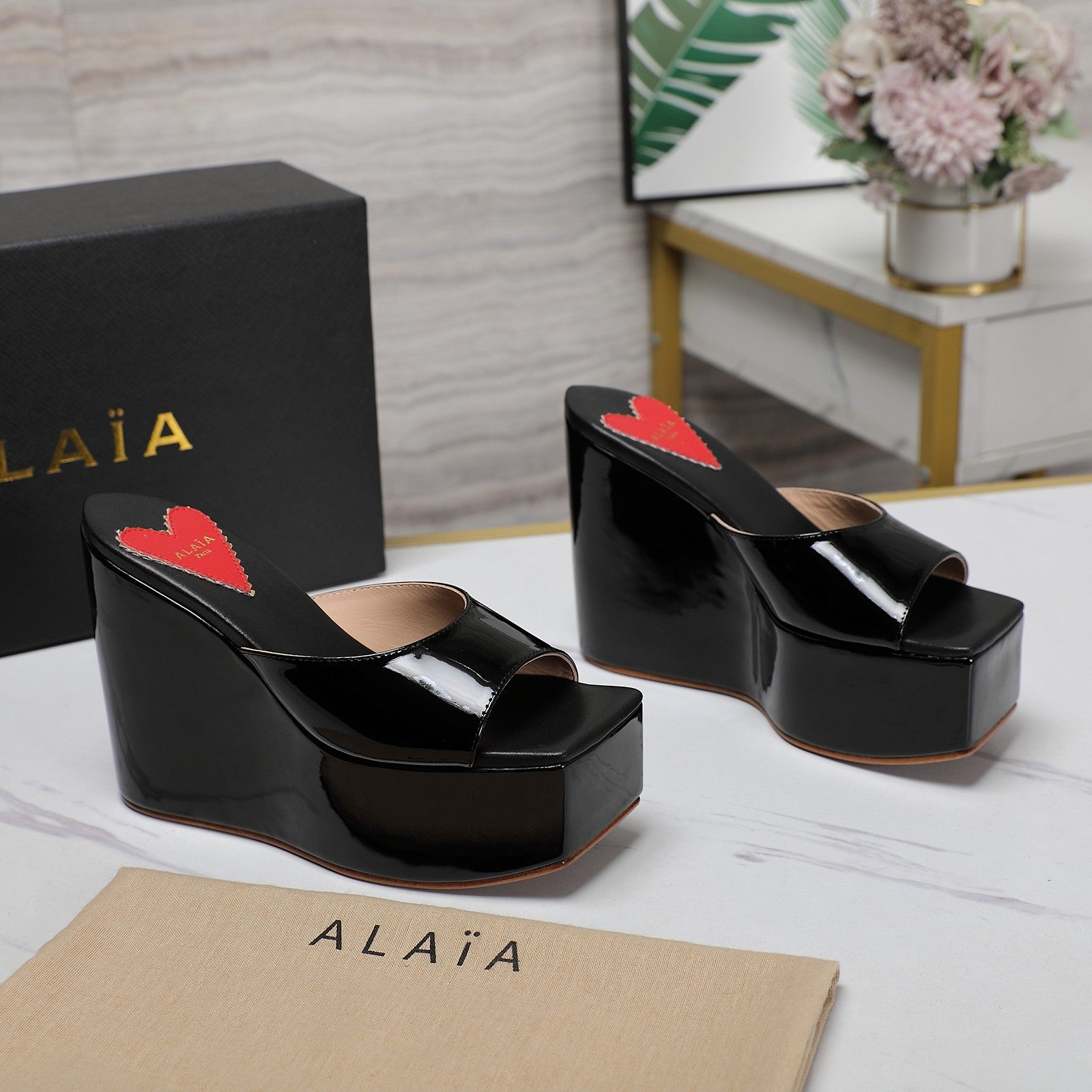 ALAIA PLATFORM WEDGE IN BLACK LAMBSKIN WITH RED HEART
