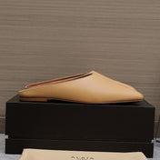 ALAIA FLAT MULE IN SEPIA TAN LAMBSKIN