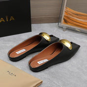 ALAIA FLAT MULE IN BLACK LAMBSKIN WITH GOLD HARDWARE