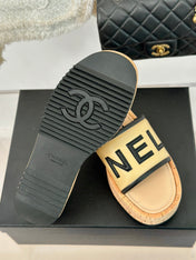 THICK SOLE LETTER SLIPPERS IN DARK CREAM SHEEPSKIN