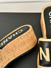 THICK SOLE LETTER SLIPPERS IN BLACK SHEEPSKIN