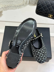 CC FLAT MULES 25SS IN BLACK EMBELLISHED WITH RHINESTONES