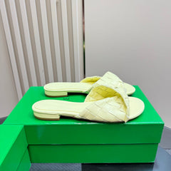 BLINK FLAT MULE IN PASTEL YELLOW INTRECCIATO LEATHER