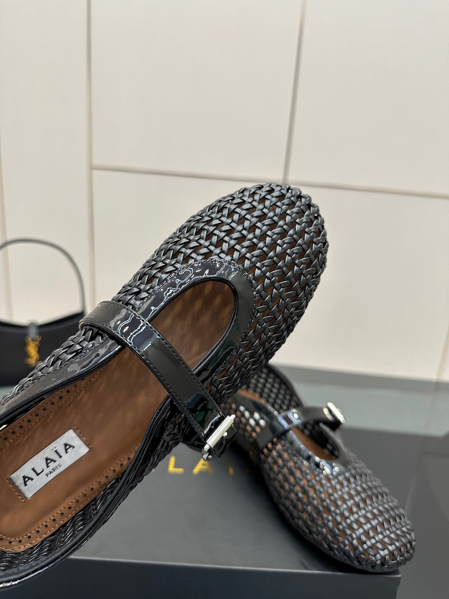 ALAIA MARY JANE FLAT 25S IN BLACK WOVEN MESH