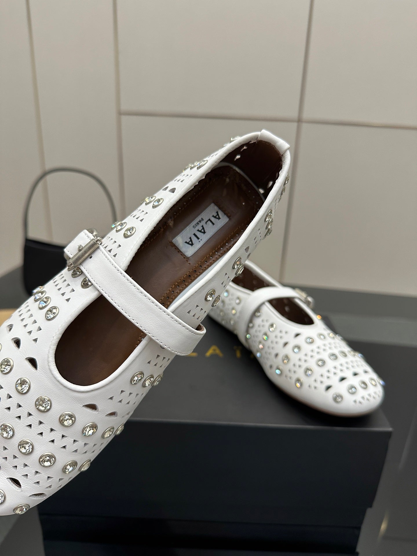 ALAIA BALLET SHOES 25S IN WHITE LAMBSKIN WITH CRYSTAL DETAILING