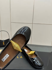 ALAIA BALLET SHOES 25S IN BLACK PATENT LEATHER WITH GOLD HARDWARE