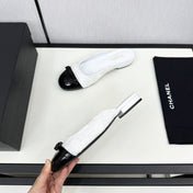 BOW MULE IN WHITE FABRIC AND BLACK CALFSKIN