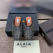 ALAIA FLAT MULES 25S IN BLACK LAMBSKIN EMBELLISHED WITH CRYSTALS