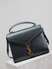 CASSANDRA TOP HANDLE BAG 24 IN BLACK CALFSKIN GOLD HARDWARE