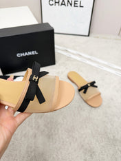 CHANEL 26S SLIDE SANDALS IN BEIGE MESH AND CALFSKIN WITH BLACK RIBBON