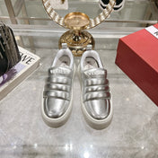 PUFFY LEATHER LOW TOP SNEAKERS IN SILVER PATENT LAMBSKIN