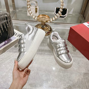 PUFFY LEATHER LOW TOP SNEAKERS IN SILVER PATENT LAMBSKIN