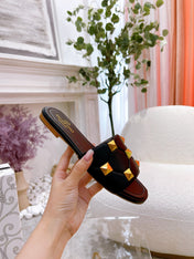 STUD FLAT SLIDE IN BLACK LAMBSKIN