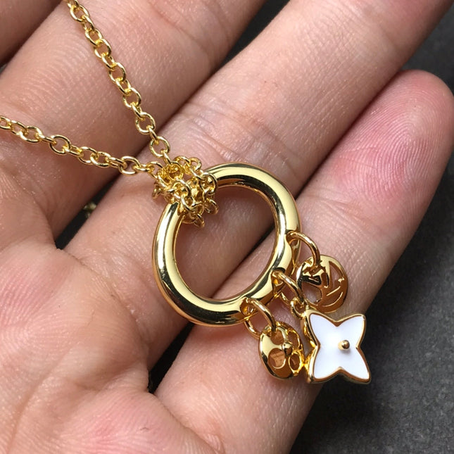 STAR AND SUN MOP PENDANT GOLD NECKLACE