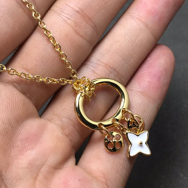 STAR AND SUN MOP PENDANT GOLD NECKLACE